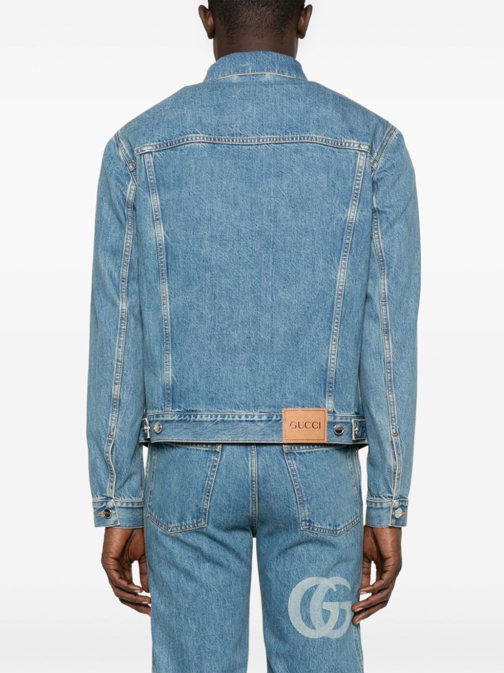 Gucci veste en jean